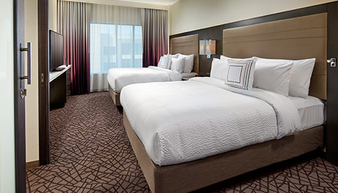 Deluxe 1 Bedroom Suite - bedroom with 2 queen beds