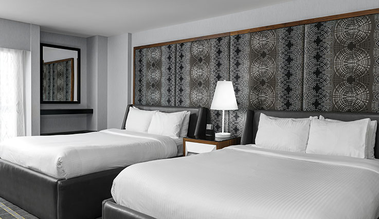 Chambre de luxe avec lits queen